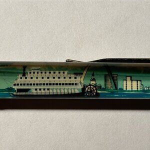 Saint Louis Missouri Floaty Pen Paddlewheel River Boat Moves Past City & Arch